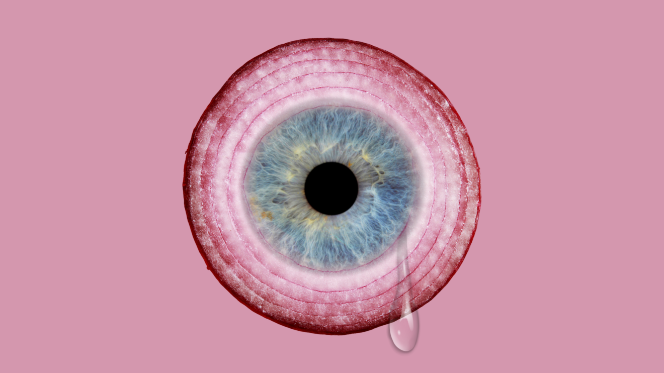 An onion ring with a human eye inlaid at the centre, a solitary tear drop falling from it
