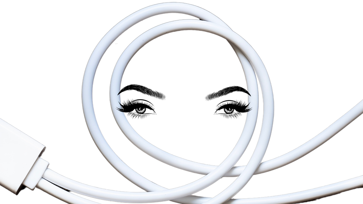 Two feminine looking eyes surrounded by a loop of USB charging cable